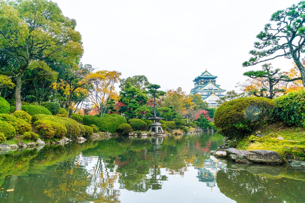 creek in garden with pagoda in background